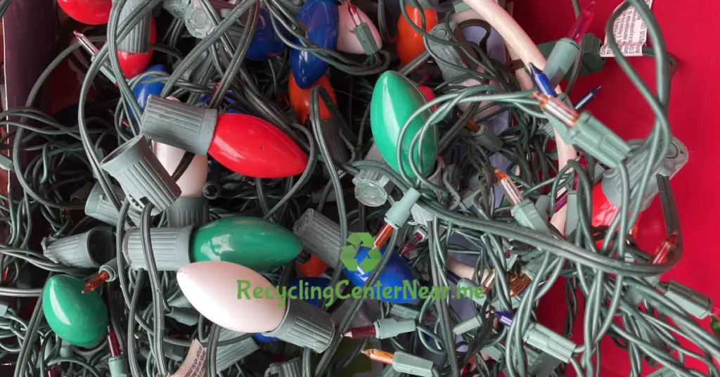 old christmas lights in a bin